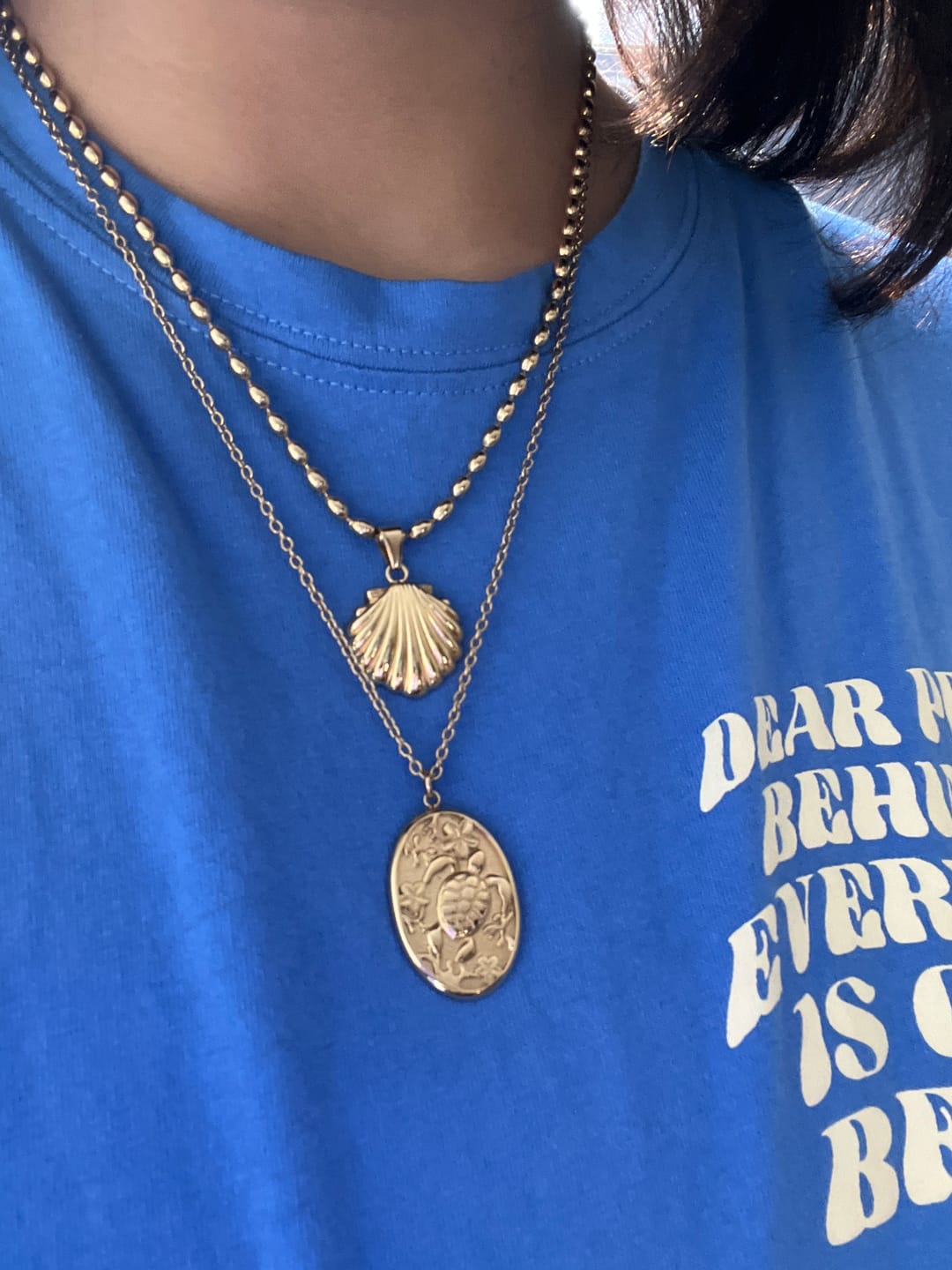 Customer photo review of Coral Bloom Turtle Necklace