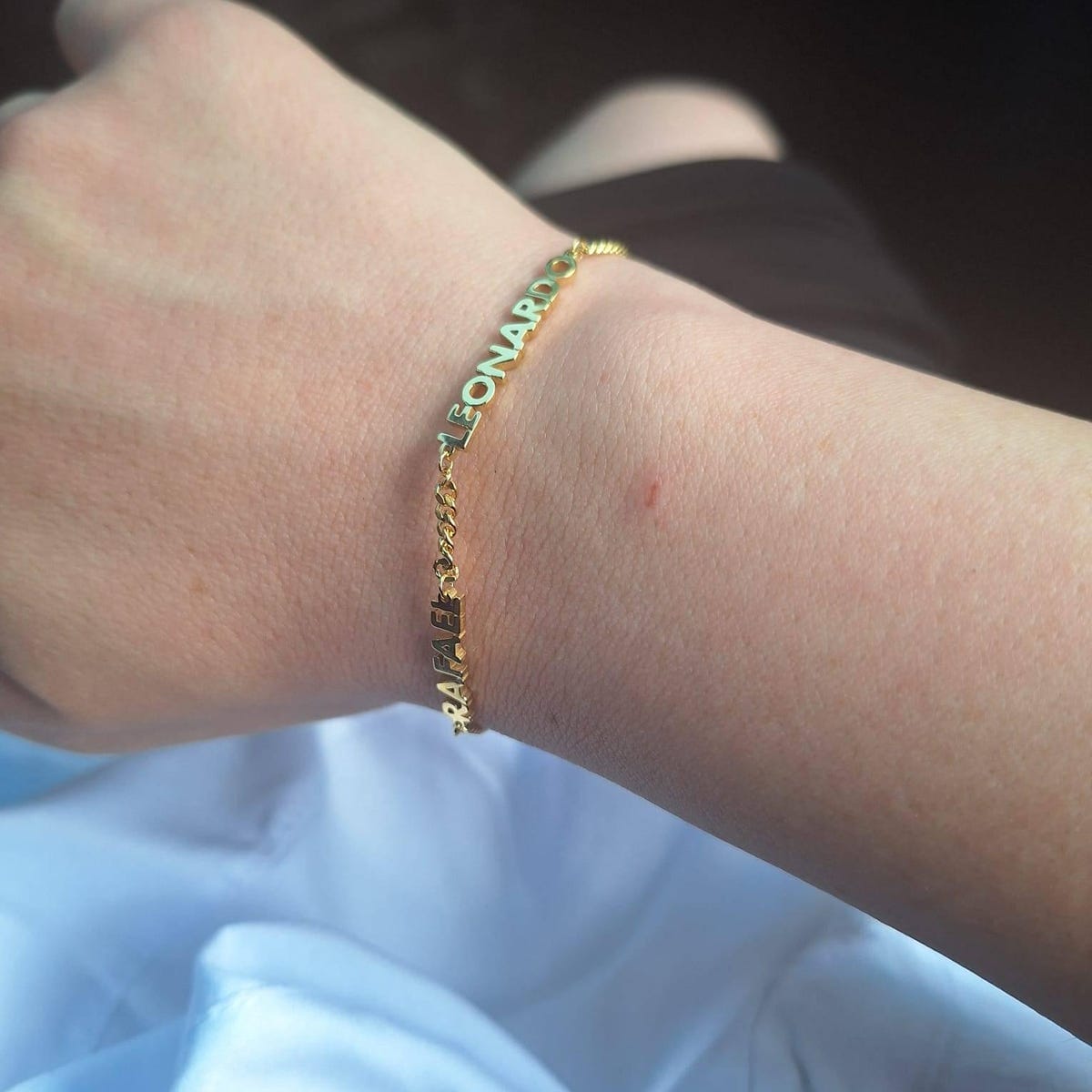 Customer photo review of Pulseira com Nome Personalizada