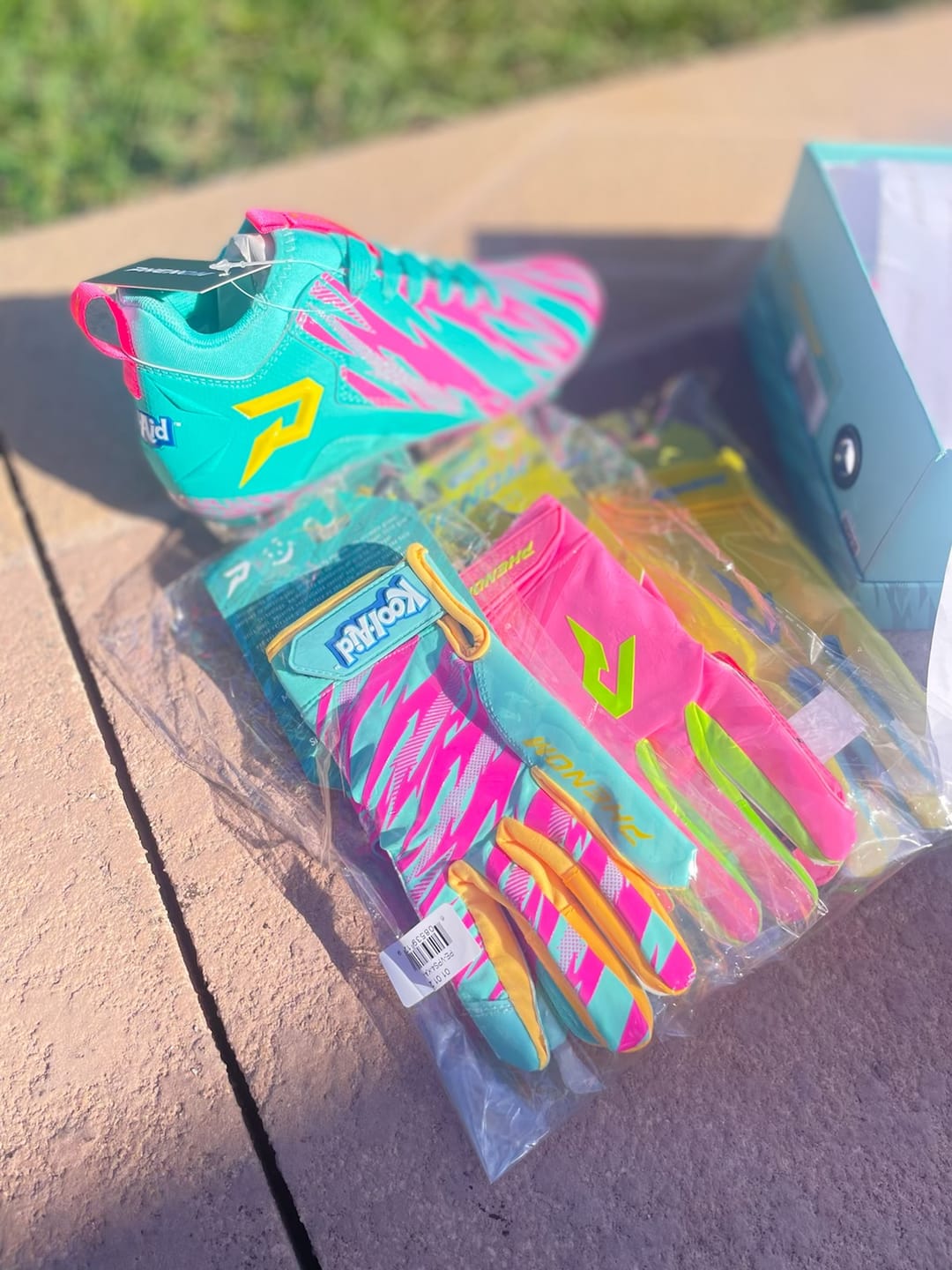 Customer photo review of Kool-Aid 'Sharkleberry Fin' Football Cleats - Quantum Speed by Phenom Elite