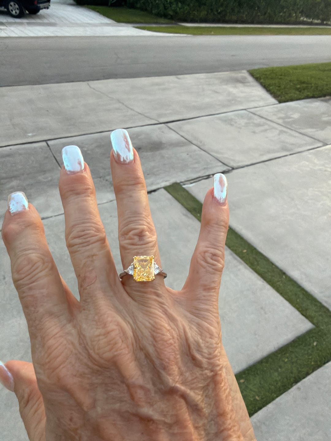 Customer photo review of S925 4.0Ct Radiant & Triangle Cut Yellow Stone Three Stone Engagement Ring In Sterling Silver