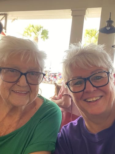 Customer's photo of two smiling people, uploaded for their Custom Air Freshener.