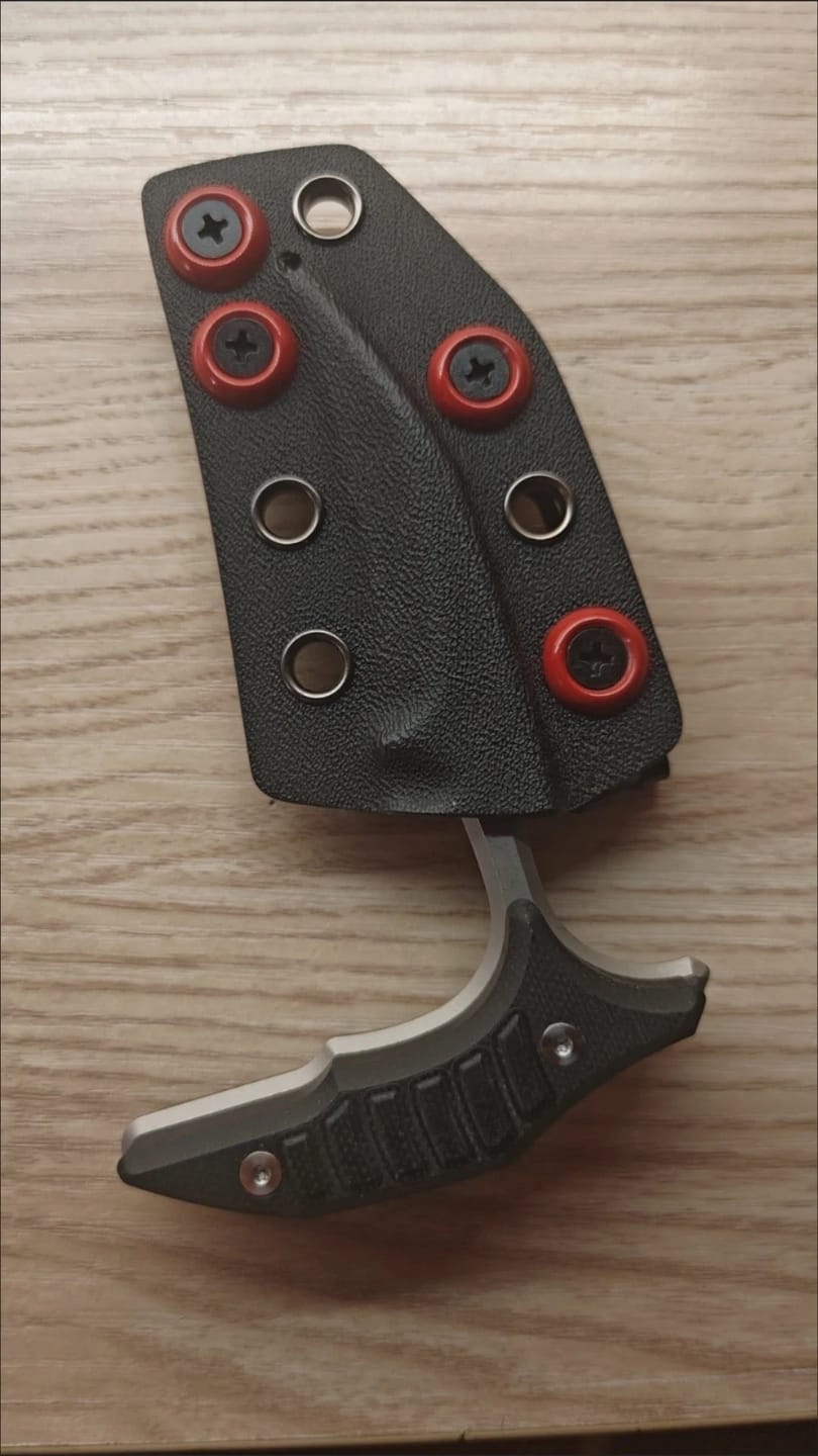 Customer photo review of MicroTech Double Bee Shape Push Dagger - Serrated Blade