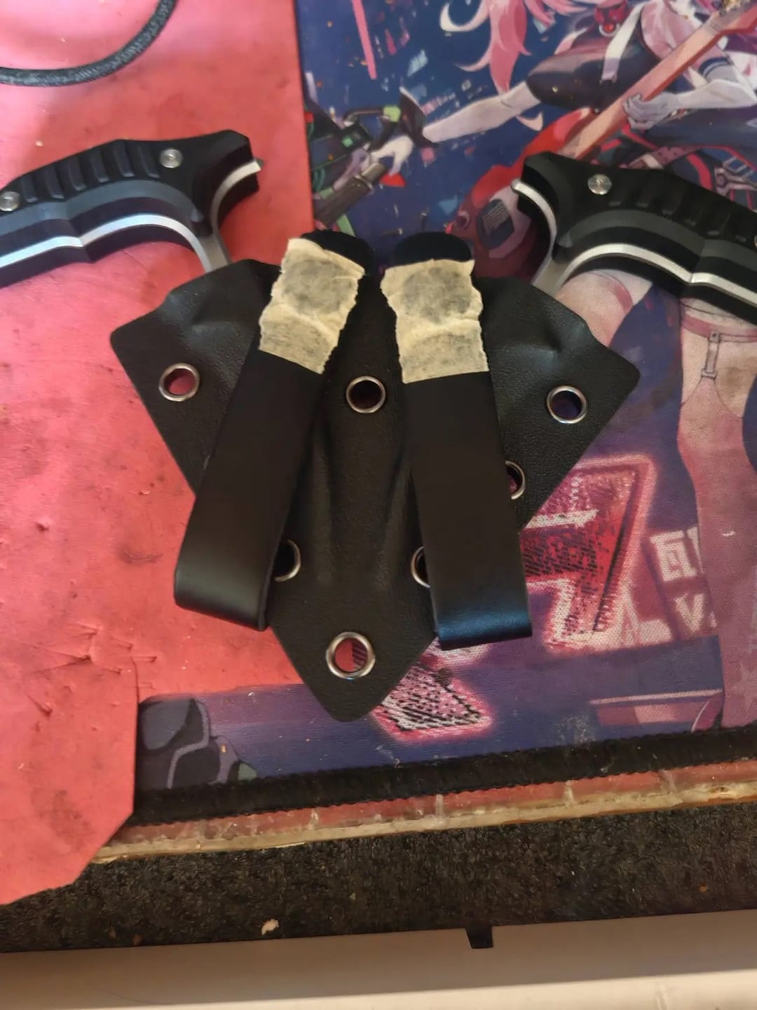 Customer photo review of MicroTech Double Bee Shape Push Dagger - Serrated Blade