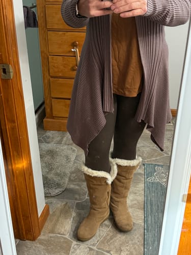 Customer wearing the Bracken Piper Pocket Leggings, styled with a long sweater and boots.