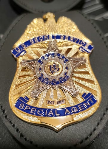 Customer photo review of USSS US Secret Service Special Agent Badge Solid Copper Replica Movie Props