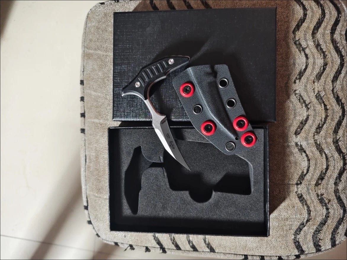 Customer photo review of MicroTech Double Bee Shape Push Dagger - Serrated Blade
