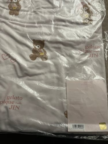Customer's pink Bear Pattern Long Pants in the original clear plastic packaging.