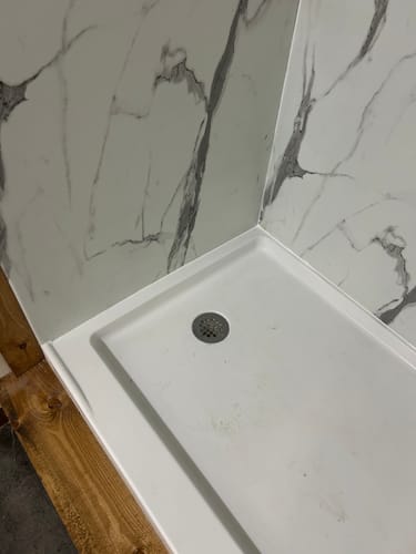 Customer photo review of Floor Crack Repair - Tub and Shower Repair Kit