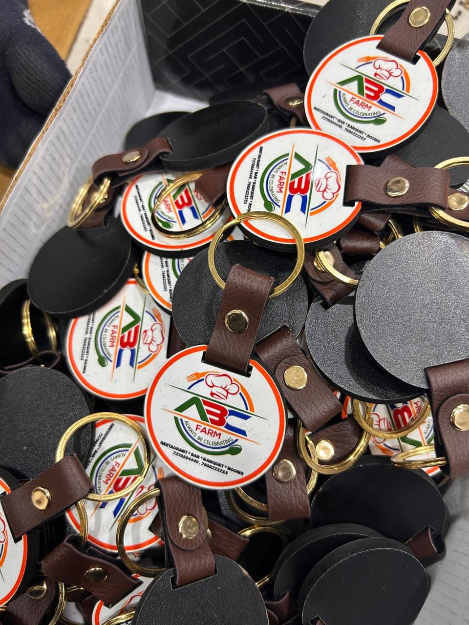 Customer photo review of Customized Premium Belt Keychains | Best for Brand Promotion | PrintMine.in