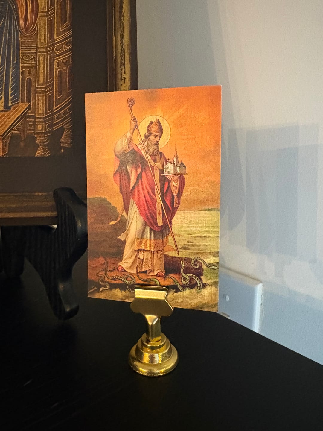 Customer photo review of Holy Card Stand – Stand Only – (Holy Card Not Included) – Brass-Colored Steel Stand to Display Holy Card