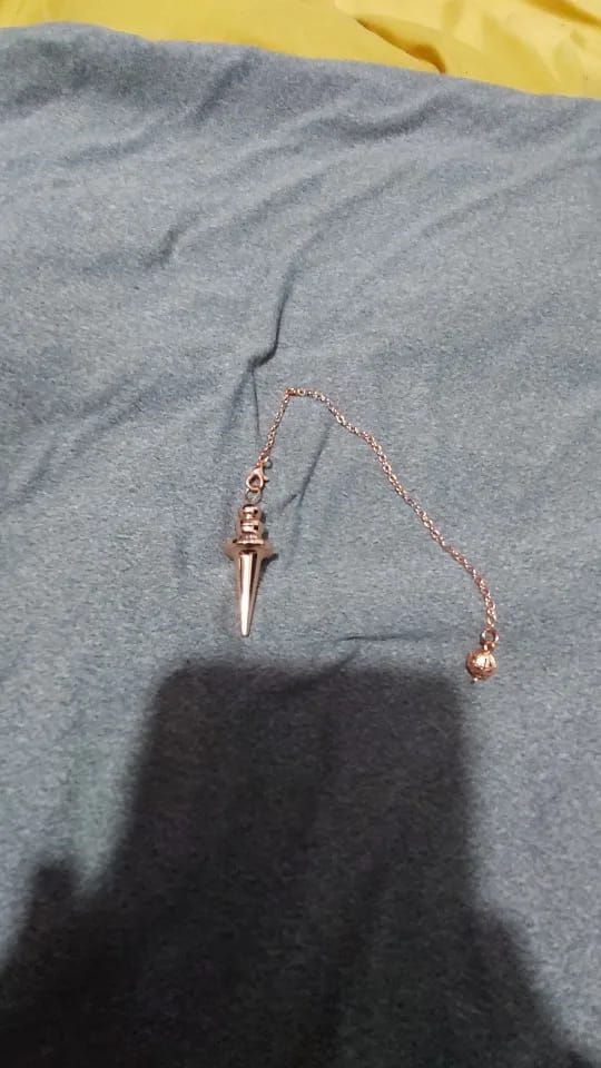 Customer photo review of Pendule Divinatoire Radiesthésie Metal Reiki Égyptien Professionnel