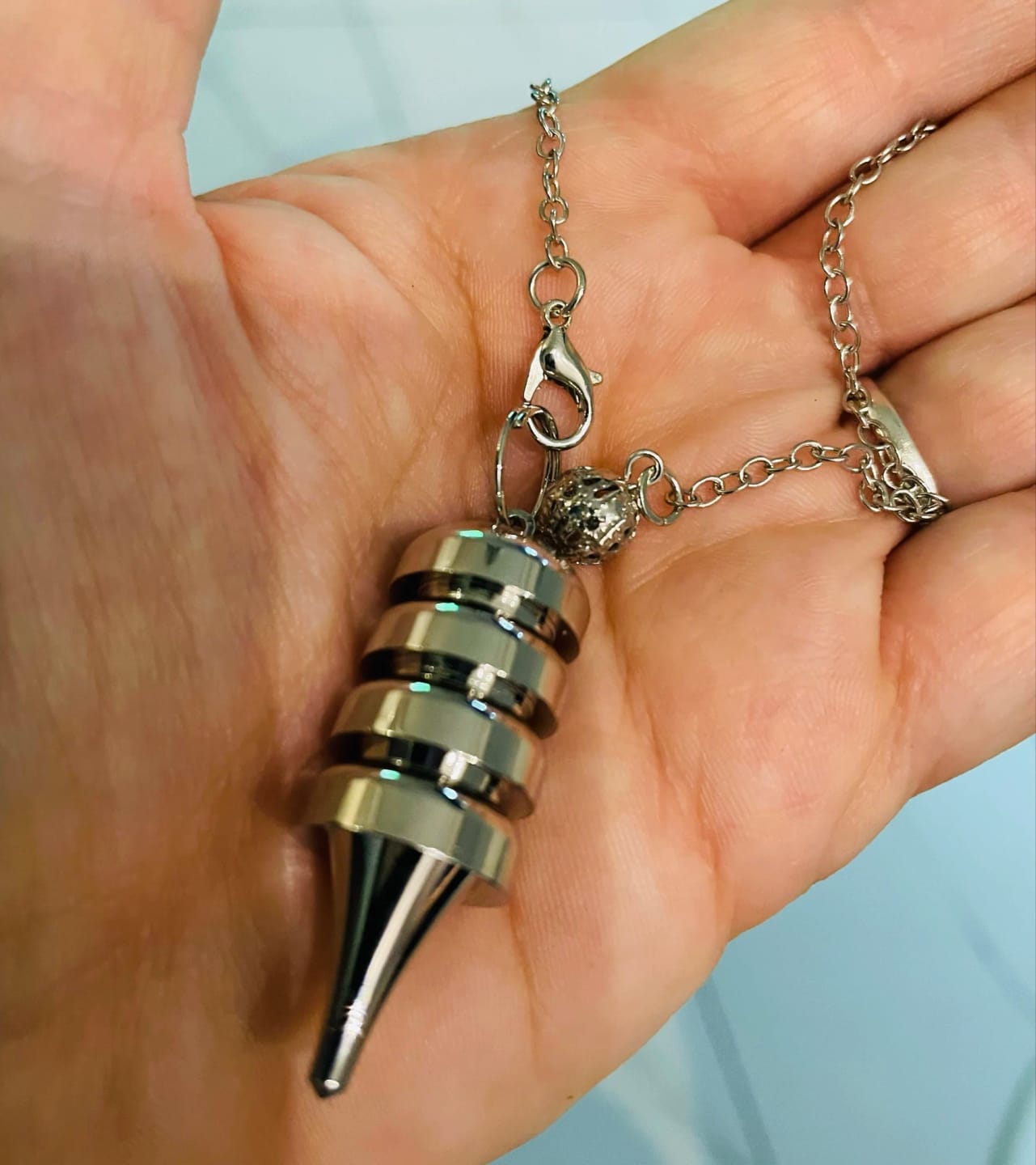 Customer photo review of Pendule Divinatoire Radiesthésie Metal Reiki Égyptien Professionnel
