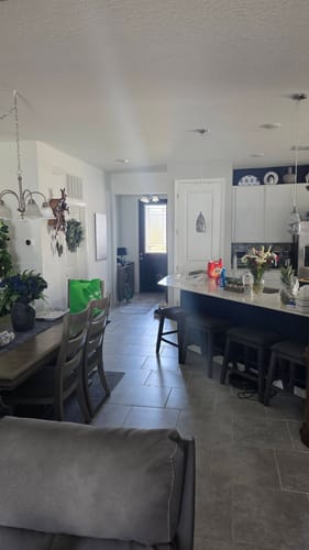 Customer's view from inside their home showing the Connecticut Glass Kit letting bright light through the front door.