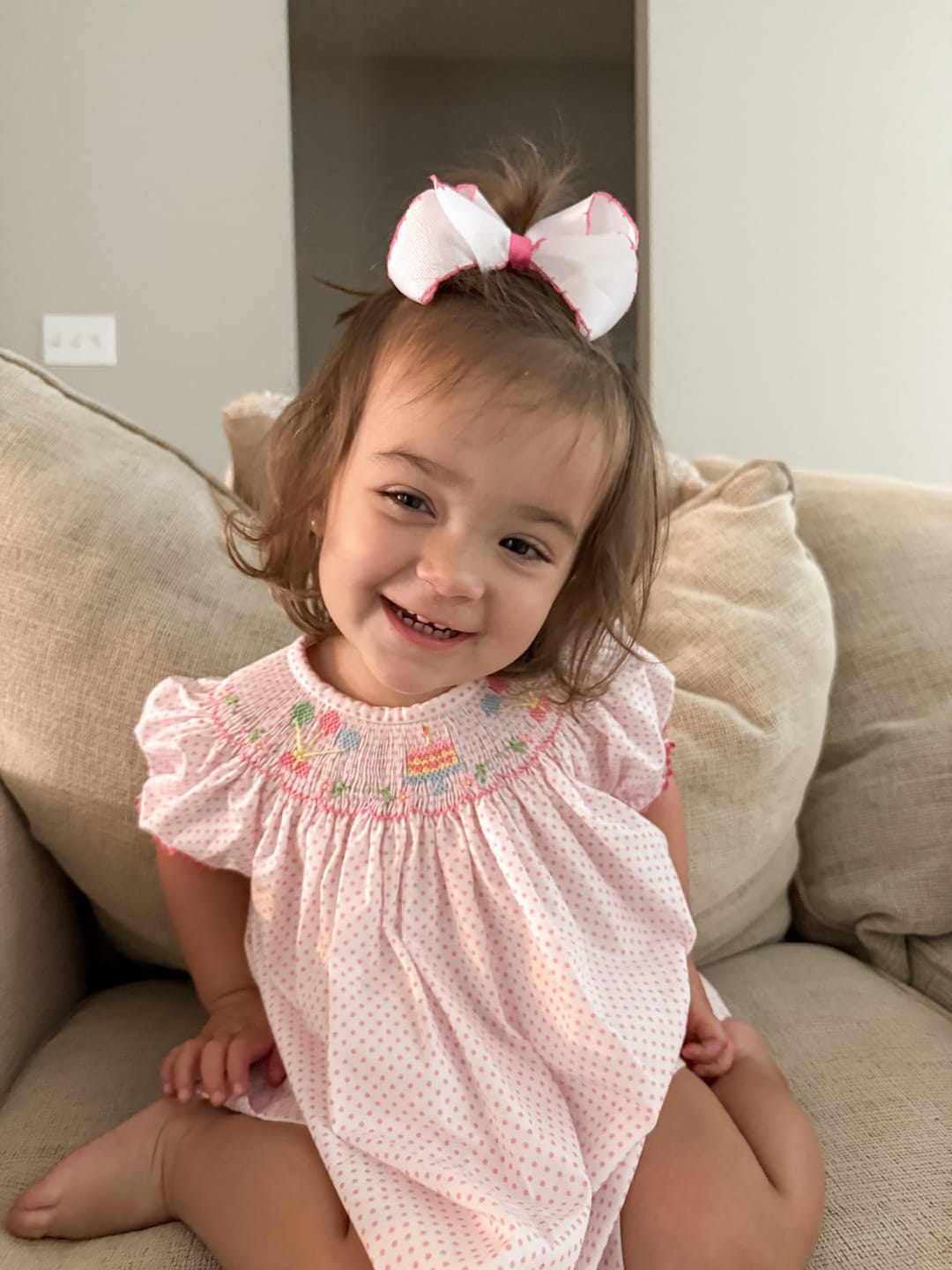 Customer photo review of Birthday Party Smocked Pink Dot Dress