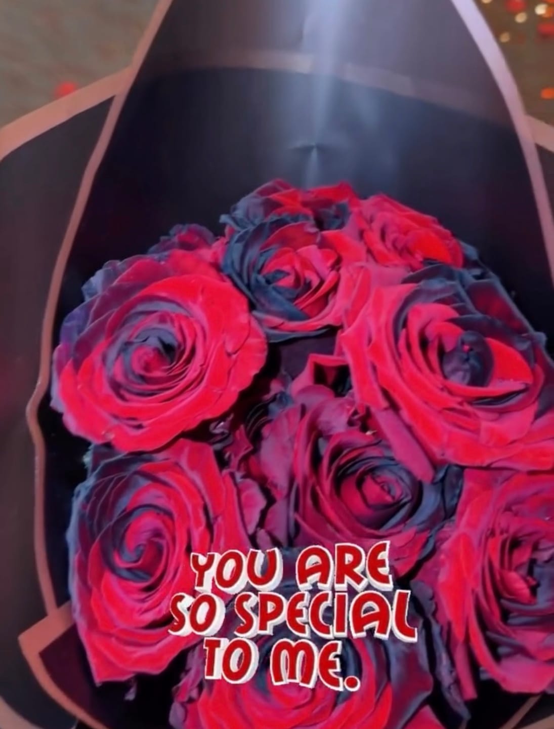 Customer photo review of Black and Red Tinted Roses
