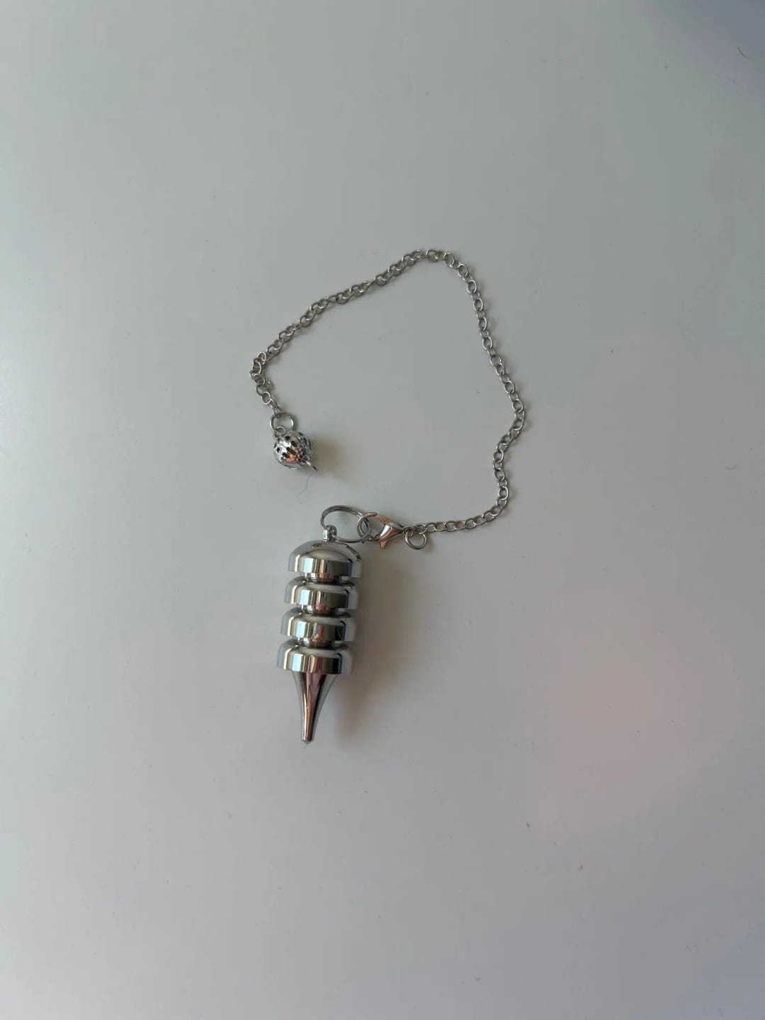 Customer photo review of Pendule Divinatoire Radiesthésie Metal Reiki Égyptien Professionnel