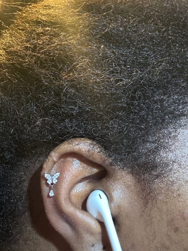 Customer photo review of Dangle Butterfly Labret Piercing - Titan