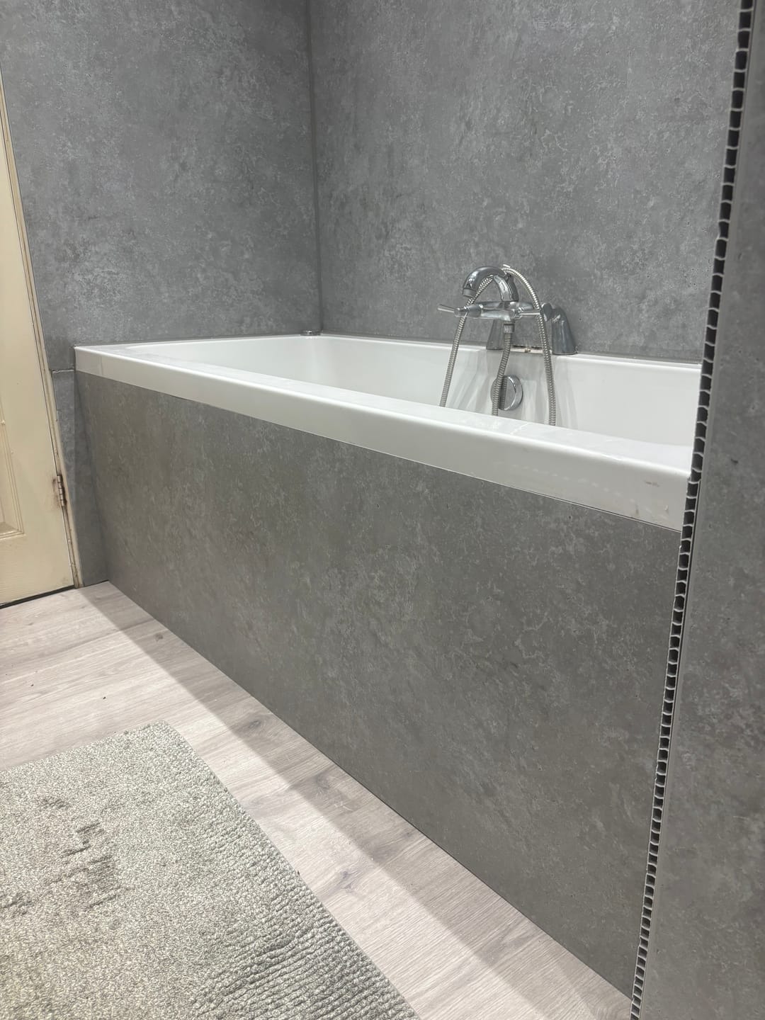 Customer photo review of Premium Grey Concrete Matt Shower Wall Panel – 1M x 2.4M