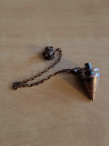 Customer photo review of Pendule Divinatoire Radiesthésie Metal Reiki Égyptien Professionnel