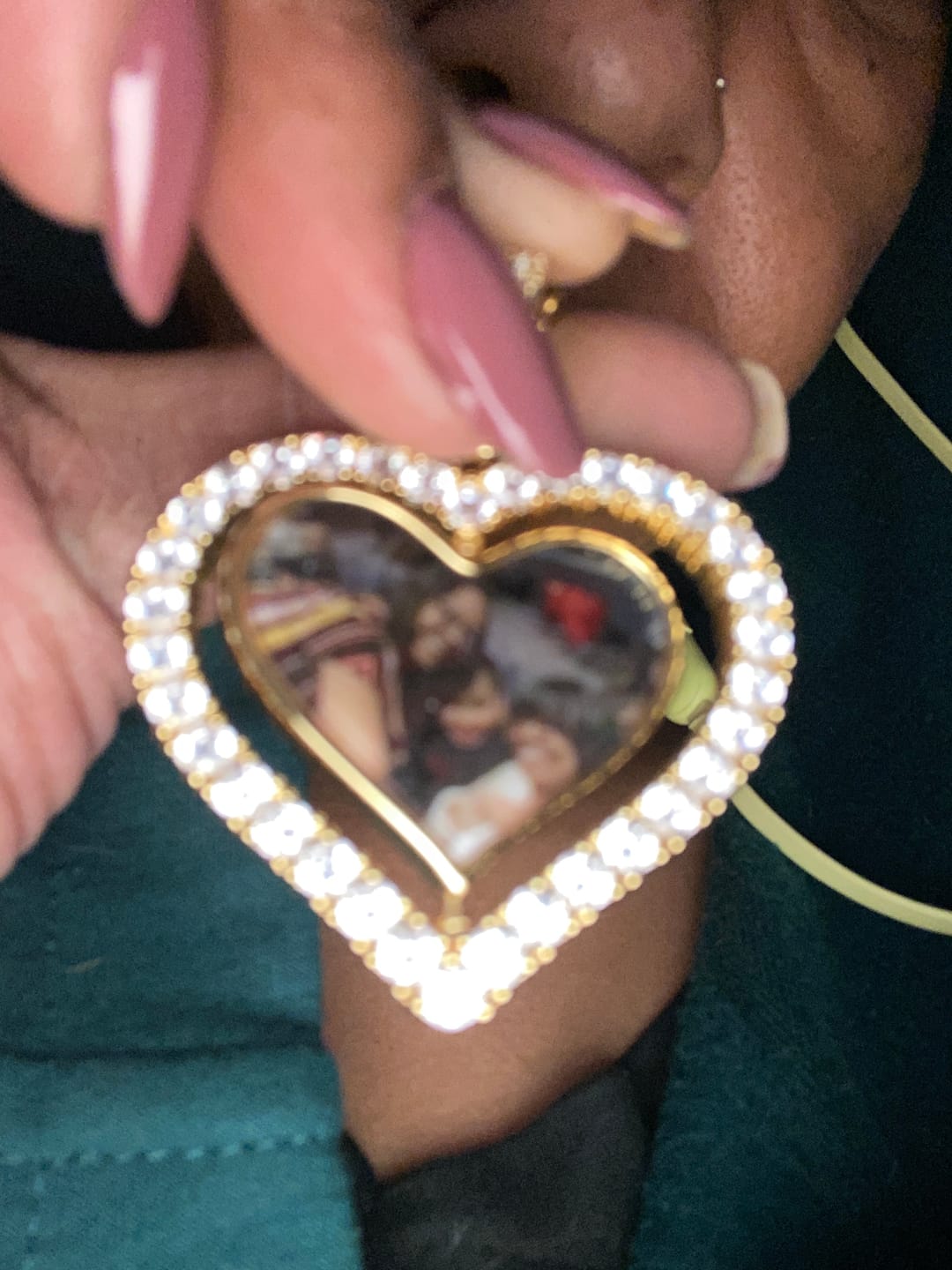 Customer photo review of Iced Heart Spinning Photo Pendant