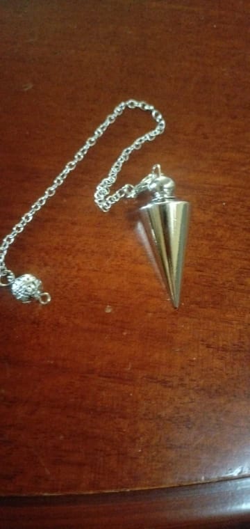Customer photo review of Pendule Divinatoire Radiesthésie Metal Reiki Égyptien Professionnel