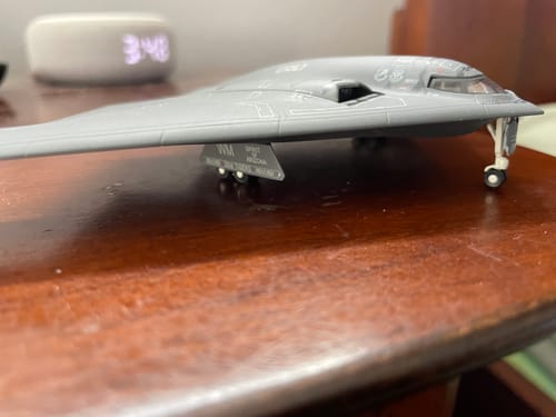 Reviewer's HERPA USAF B-2A model airplane sitting on its landing gear on a wooden surface.