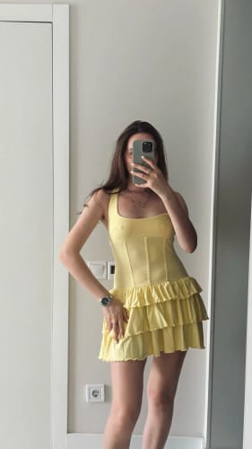 Customer photo review of Mira Ruffled Halter Mini Dress