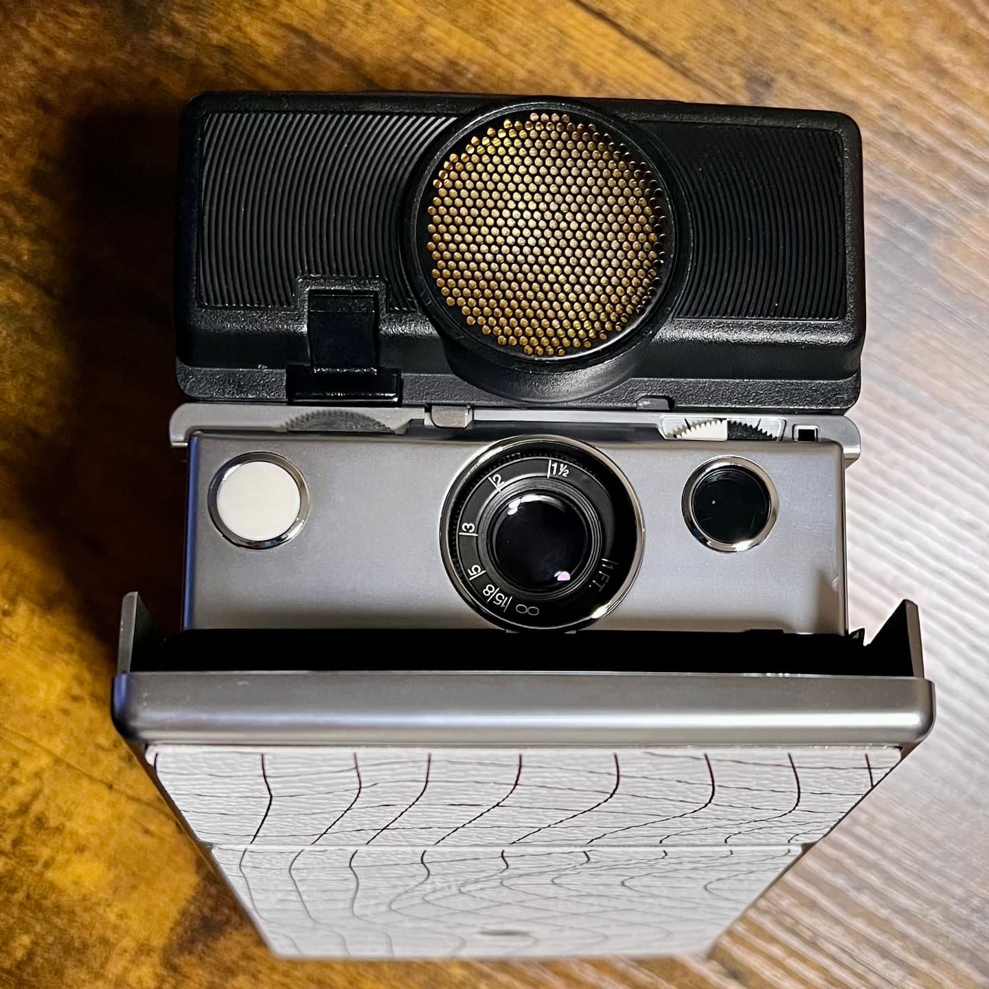Customer photo review of Polaroid Folding Camera Replacement Button and Installation Service