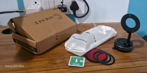 Customer's 360° MagPro Magnetic Phone Holder unboxed with its packaging, bag, and magnetic rings on a table.