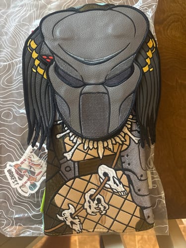 Customer's Predator "Jungle Hunter" Driver Headcover in its packaging with the removable magnetic bio-mask on.