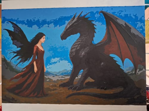 Customer's completed Paint by Numbers painting of a woman with wings facing a large black dragon in a fantasy scene.