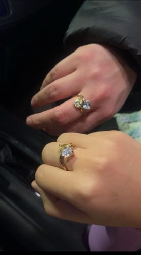 Reviewer and friend showing their matching Navae Birthstone Rings on their hands.