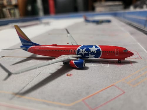 Customer's Gemini Southwest 737-800S 'Tennessee One' model on a detailed airport tarmac display.