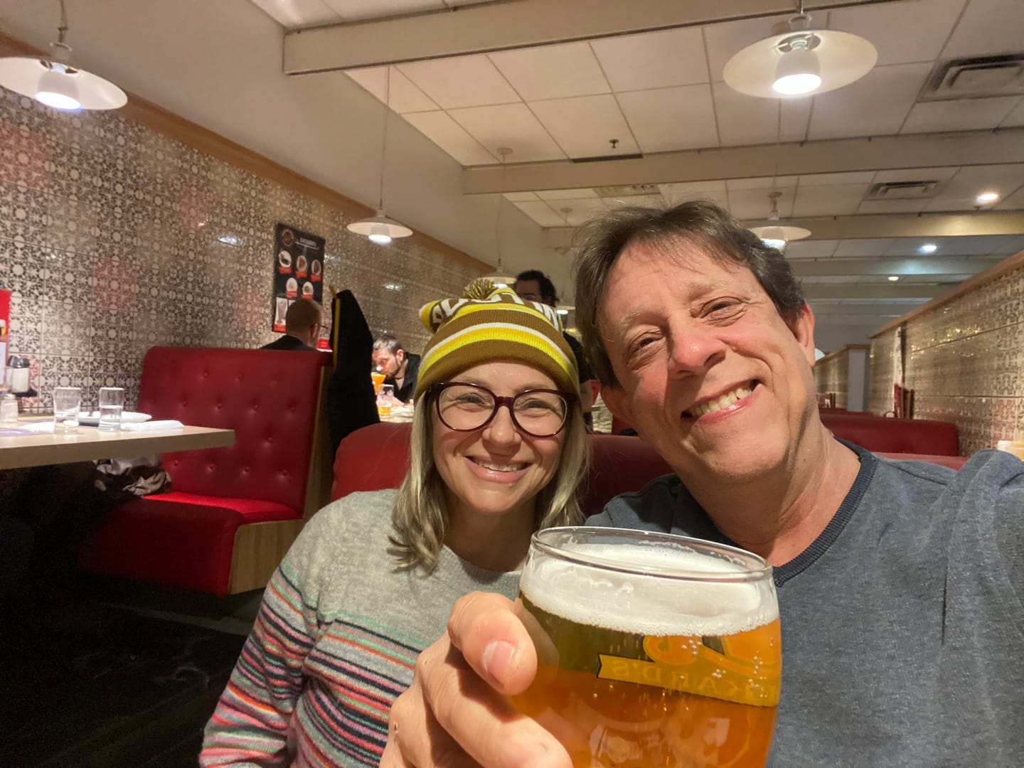 Customer photo review of POUTINE Knitted Cuffed Tuque with Pom Pom