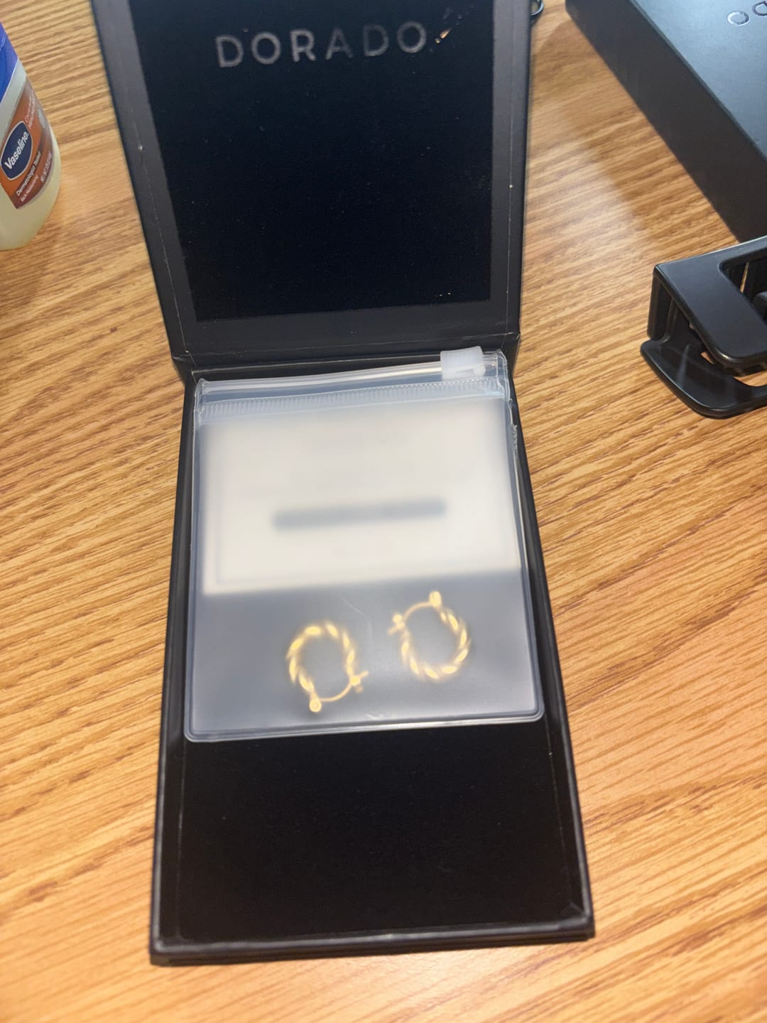 Customer photo review of Twist Hoop Earrings