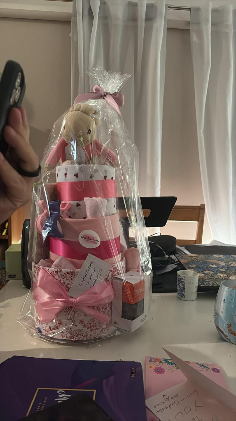 Customer photo review of It’s A Baby Girl Luxe Nappy Cake