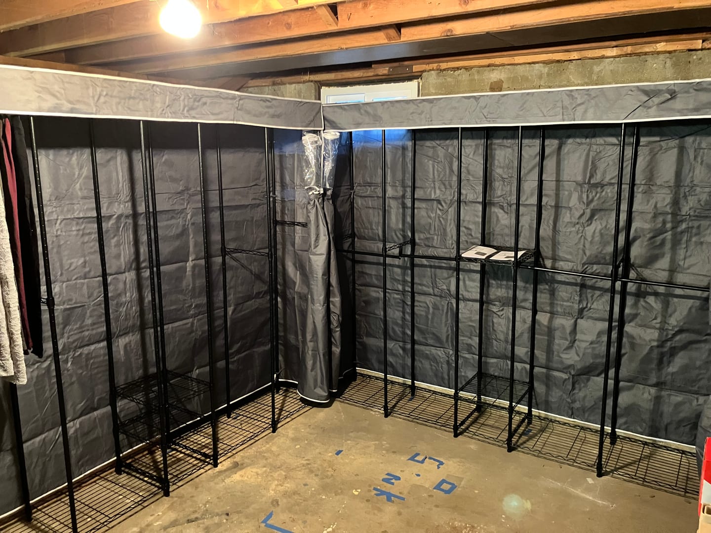 Customer photo review of Raybee 90.6''W Heavy Duty Clothes Rack with Cover,1200lbs Freestanding Garment Rack for Bedroom