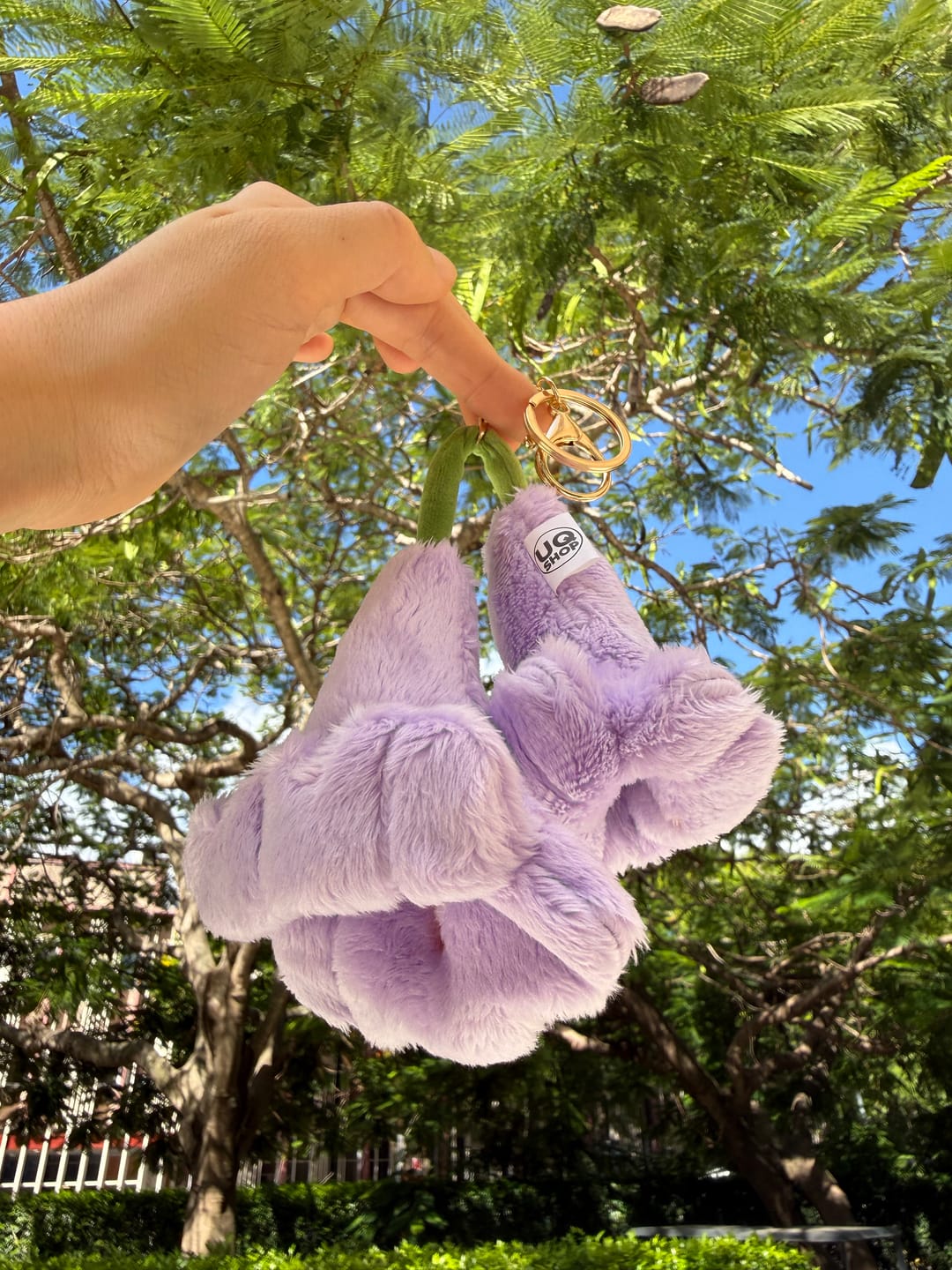 Customer photo review of UQ Jacaranda Plush Keyring