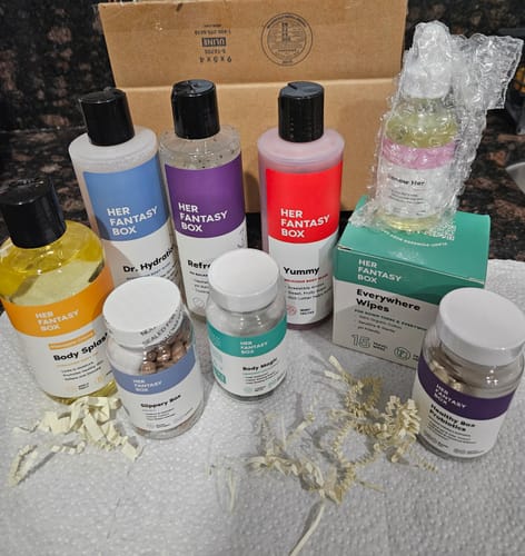 Customer's Balance Bundle 2.0 products, including colorful bottles and jars, displayed on a countertop.