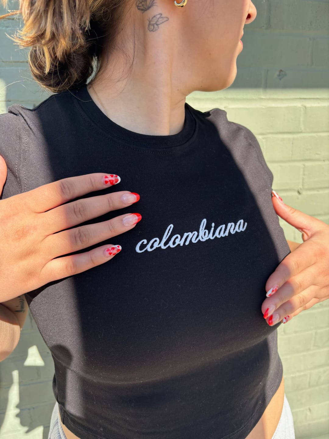 Customer photo review of 'Colombiana' Embroidered Rib Baby Tee