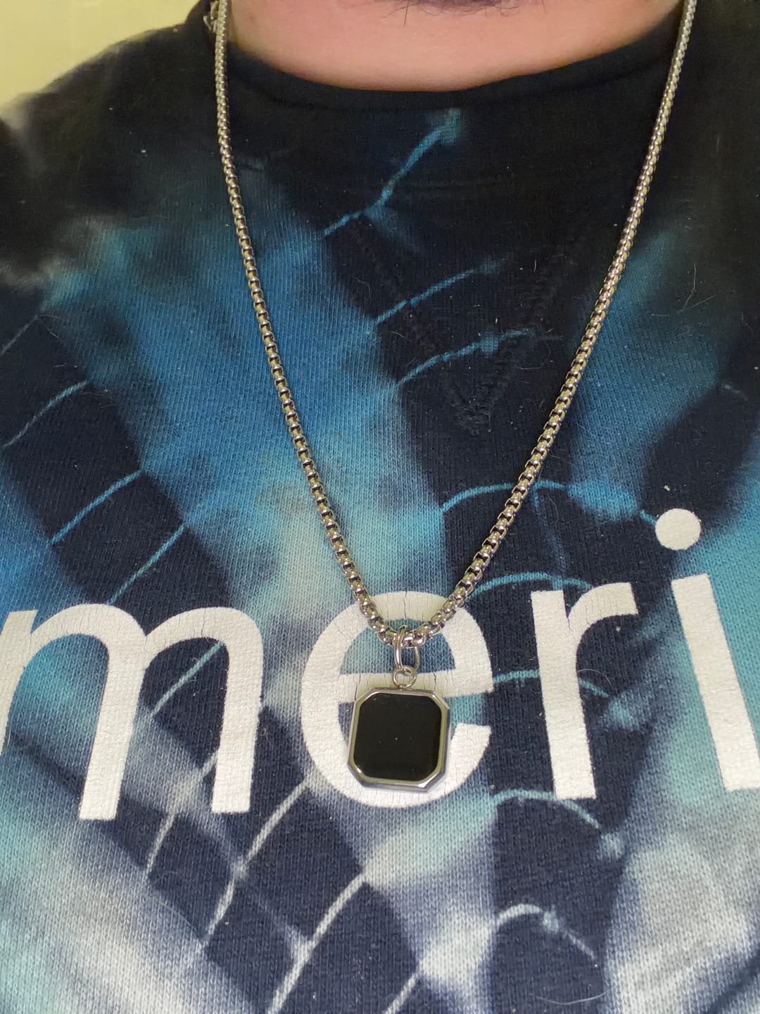 Customer photo review of THE ONYX BADGE.