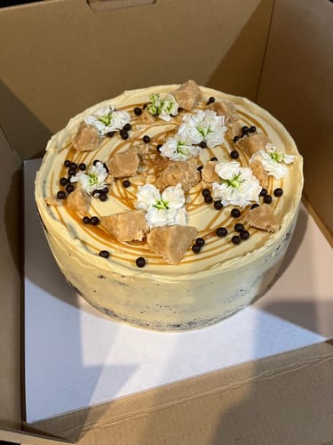 Customer photo review of chocolate caramel cake