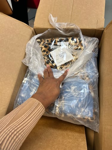 Customer photo review of WOMEN'S LONG SLEEVE ZIP UP POCKETS ELASTIC WAIST ANIMAL PRINT JOGGER LEG JUMPSUIT