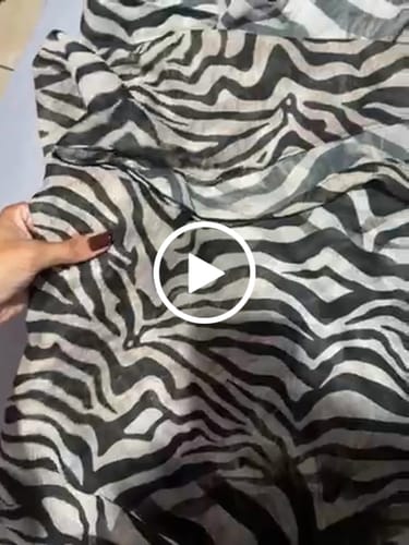 Customer video review of Pareô Multi Amarrações Em Chiffon Zebra