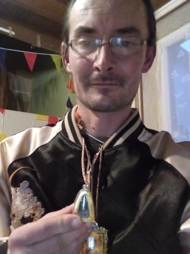 Customer photo review of Amulette Thaï de santé du Roi des guérisseurs Po Shiwok - Très Vénérable LP Uthaï.