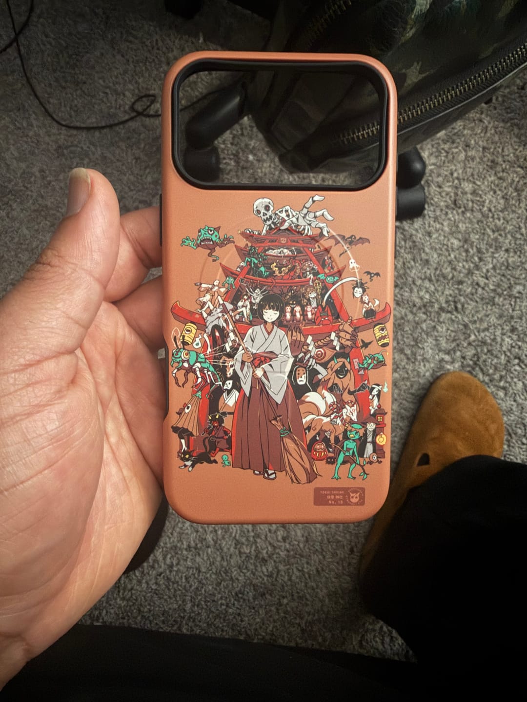 Customer photo review of Yokai Shrine iPhone Case