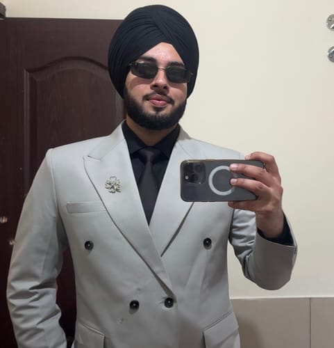 Reviewer wearing the Predator Black Rectangle Polarized Sunglasses with a light grey suit and black shirt.