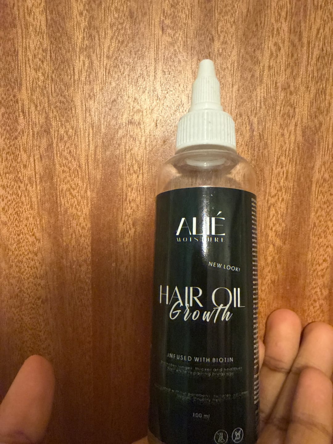 Customer photo review of ALIÉ MOISTURE'S HAIR OIL