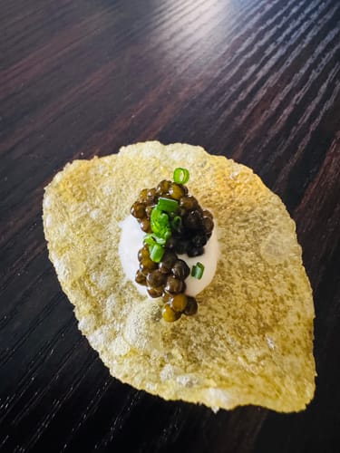 Customer photo review of Torres Potato Chips with Black Truffle