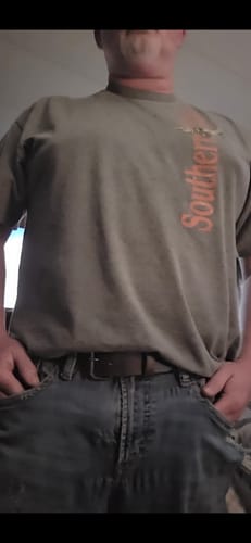 Customer wearing the brown Rustic Glazed belt with blue jeans.